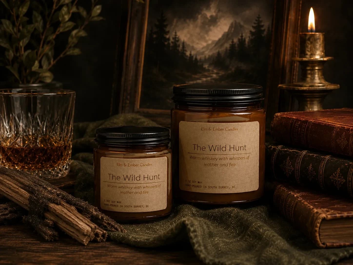 The Wild Hunt candles with a whiskey glass and old books